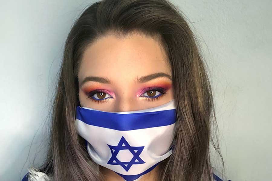 אשה מסיכה דגל ישראל